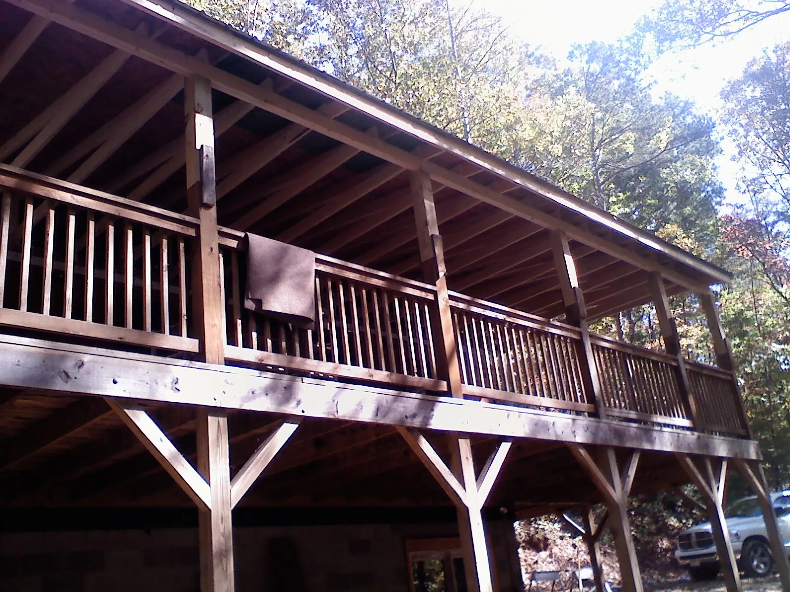 Timber framing under a new elevated porch and deck — Roof Leak Repair in Hopewell Junction by Roofing Brothers